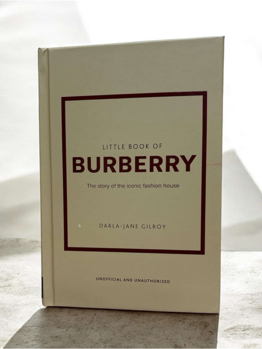 Burberry‎ Beige Hardcover Book with Burgundy Text